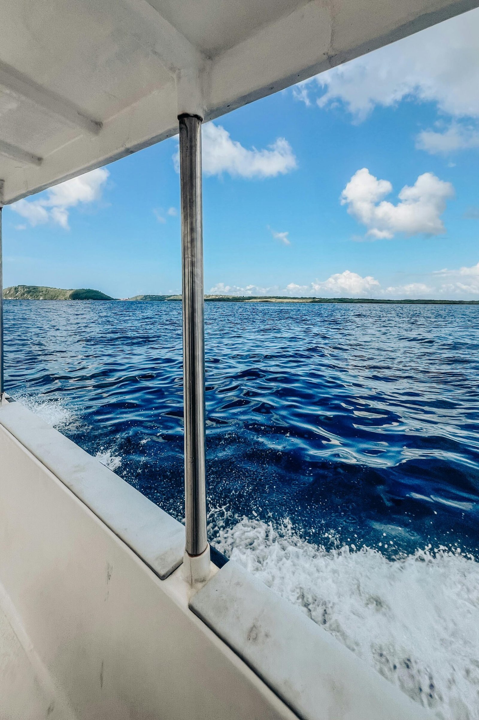 Experience a peaceful boat ride with stunning ocean views in Bali, Indonesia.